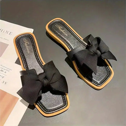 Flat bow slippers