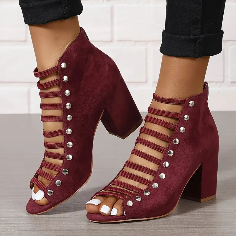 High heel sandals with back zipper, cut-out design, and rivets