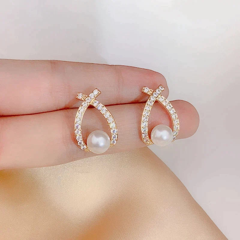 Pearl and cubic zirconia earrings