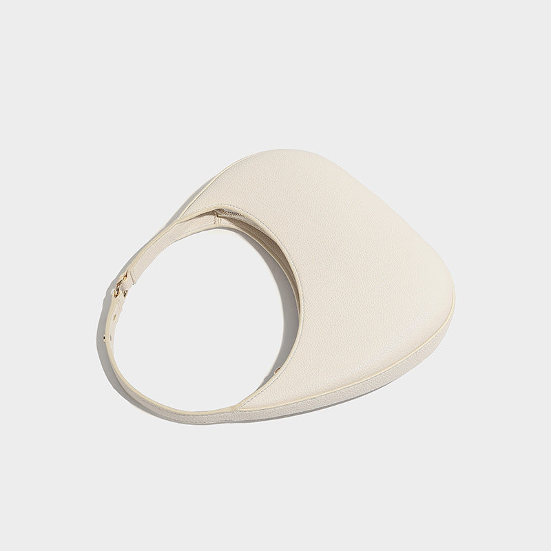 Asymmetrical half-moon bag