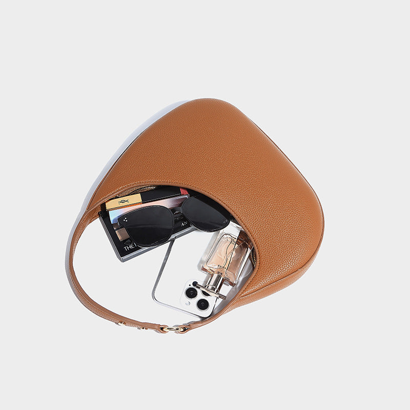 Asymmetrical half-moon bag