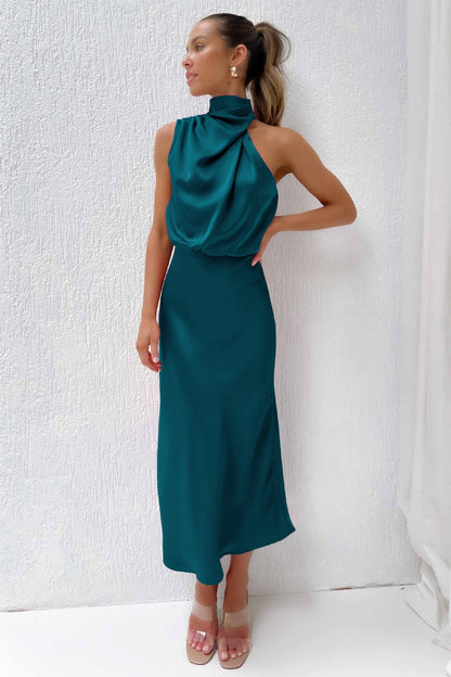 Laura | Chic women's evening dress with halter neck and flowy cut