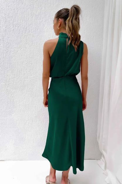 Laura | Chic women's evening dress with halter neck and flowy cut