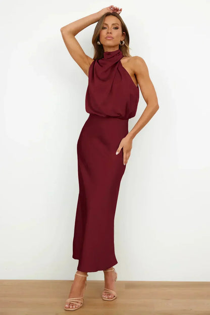 Laura | Chic women's evening dress with halter neck and flowy cut