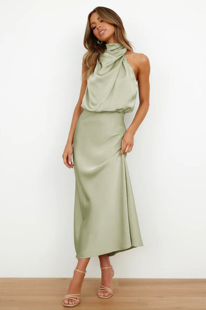 Laura | Chic women's evening dress with halter neck and flowy cut