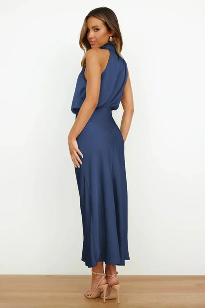 Laura | Chic women's evening dress with halter neck and flowy cut