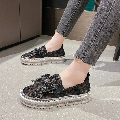 Shiny platform loafers with a bow | Insa™