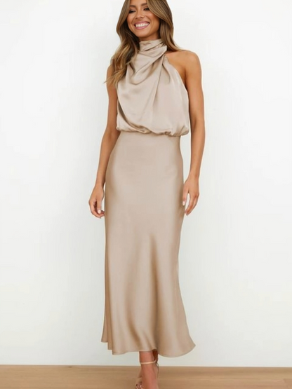 Laura | Chic women's evening dress with halter neck and flowy cut