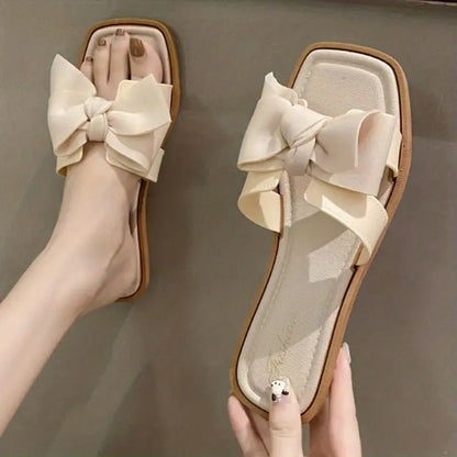 Flat bow slippers