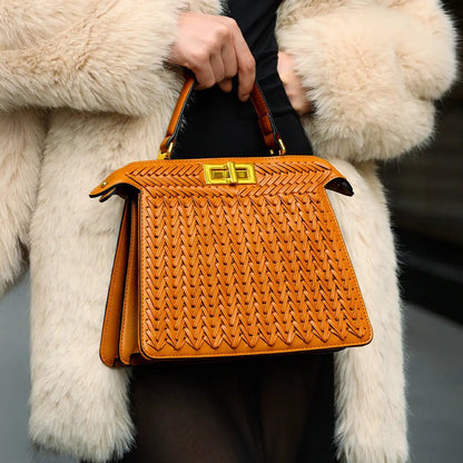 Estelle Braided Leather Handbag – Elegant Gold Clasp