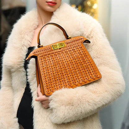 Estelle Braided Leather Handbag – Elegant Gold Clasp